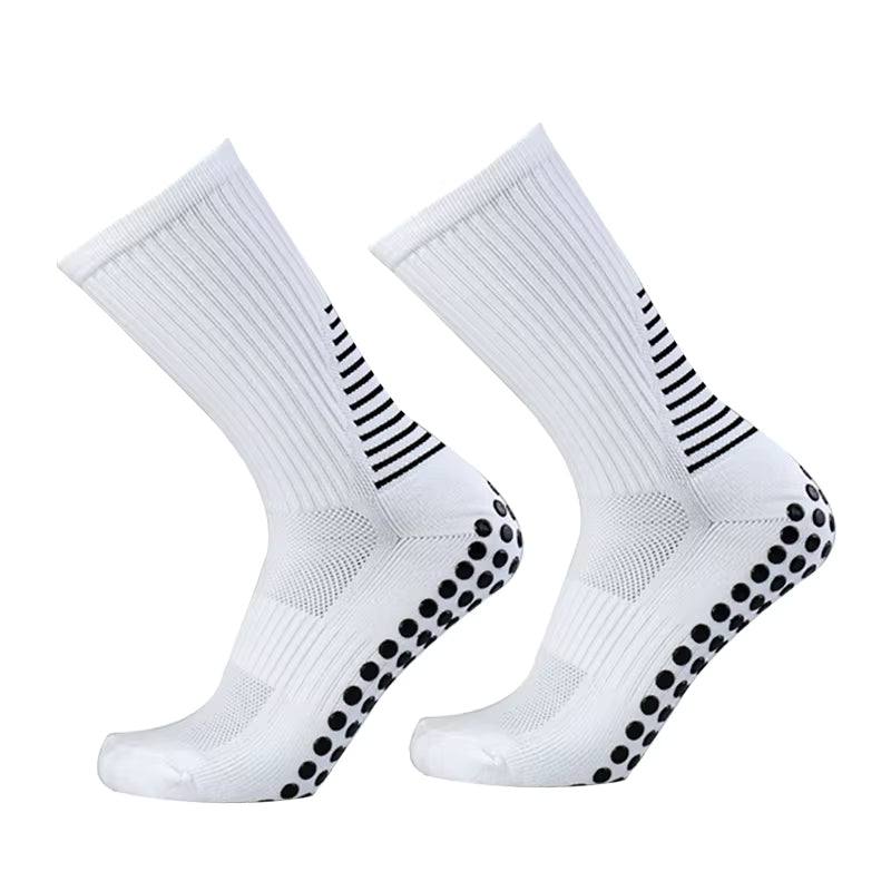 Paire de chaussettes de foot antidérapantes blanches, picots silicone noirs sous la semelle
